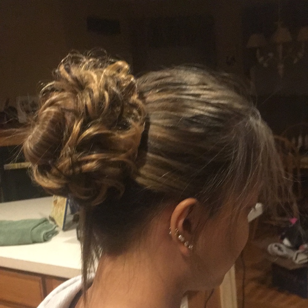 New messy bun. My daughter is modeling mine you will receive a new one